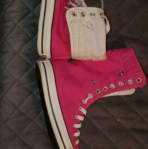 Pink converse high or low shoes